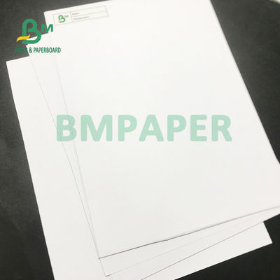 70 g / m2 75 g / m2 Biały niepowlekany papier bezdrzewny Dobry gładki 700 mm x 1000 mm